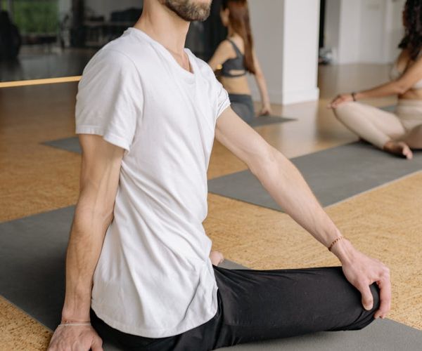 Person in a balanced pose, symbolizing mental and physical harmony.